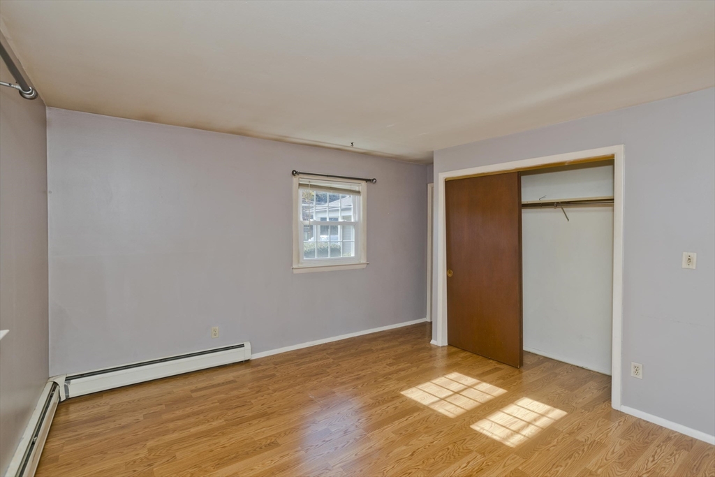 151 Bemis Road Holyoke, MA 01040 - Photo 21 of 42 a view of an empty room and window