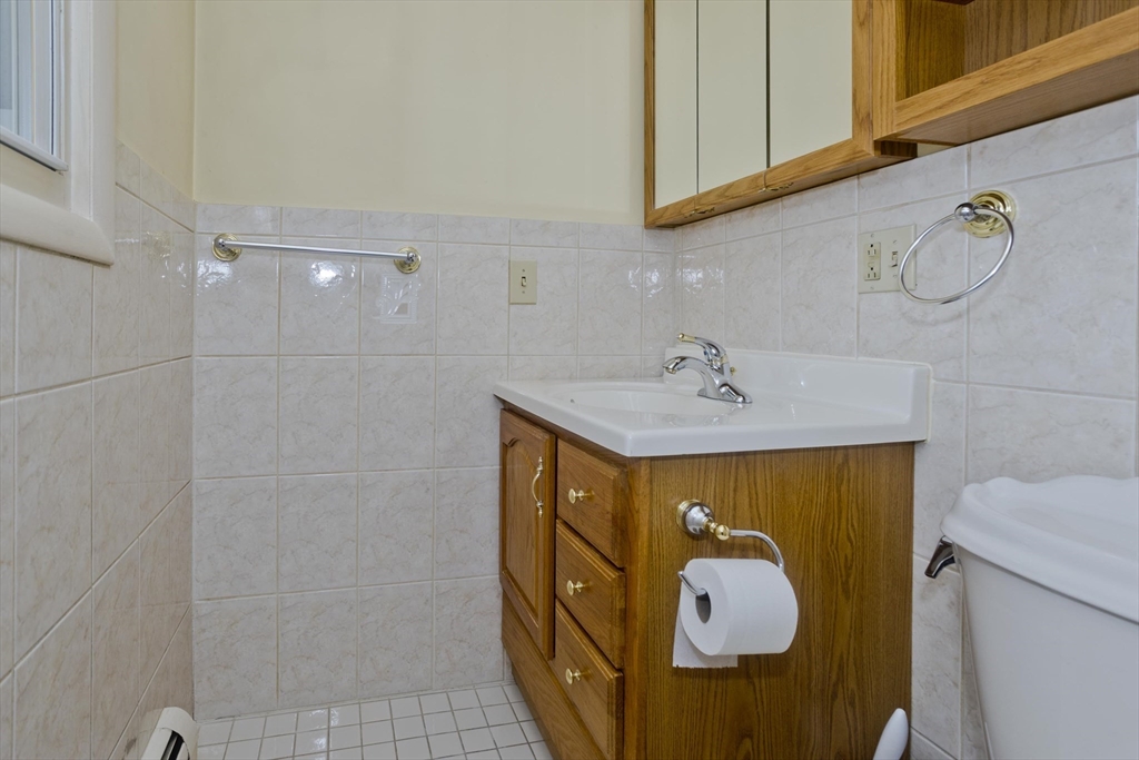 151 Bemis Road Holyoke, MA 01040 - Photo 24 of 42 a bathroom with a sink and mirror