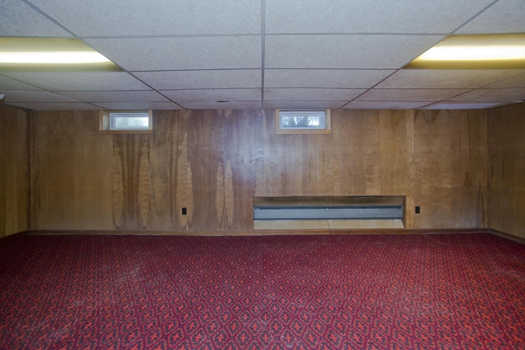 151 Bemis Road Holyoke, MA 01040 - Photo 39 of 42 a view of room with stairs and wooden floor