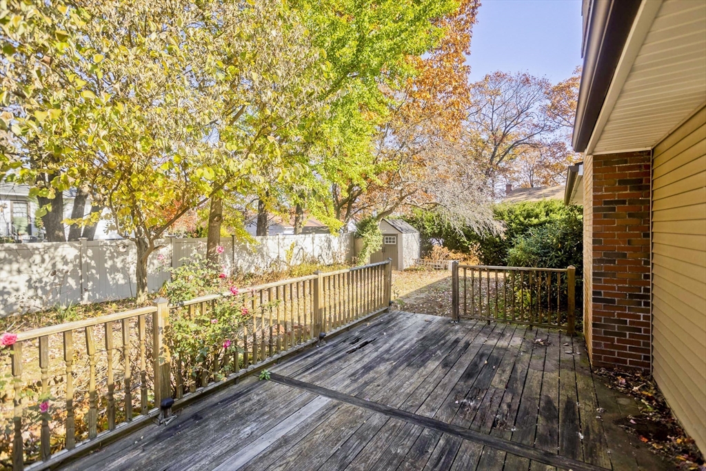 151 Bemis Road Holyoke, MA 01040 - Photo 40 of 42 a balcony with wooden floor and fence