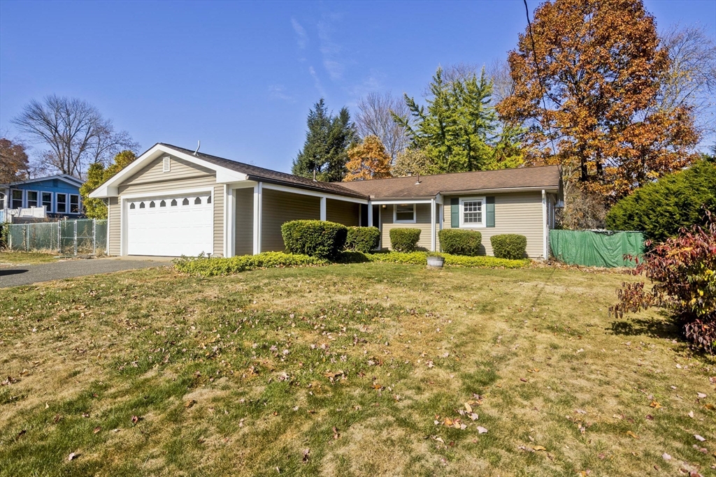 151 Bemis Road Holyoke, MA 01040 - Photo 4 of 42 a front view of a house with a garden