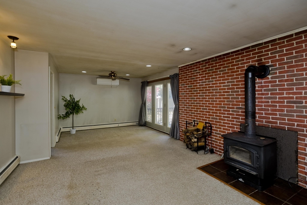 151 Bemis Road Holyoke, MA 01040 - Photo 5 of 42 a view of a livingroom with a fireplace