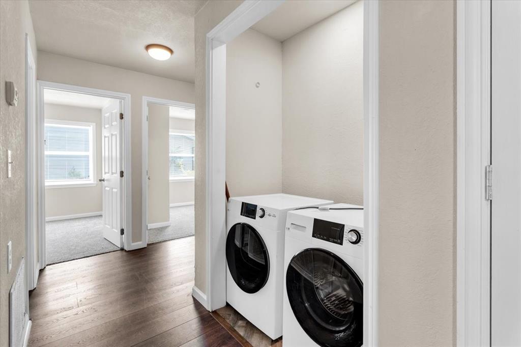 1309 Pine Street Bonham, TX 75418 - Photo 15 of 33 a view of washer and dryer in a utility room