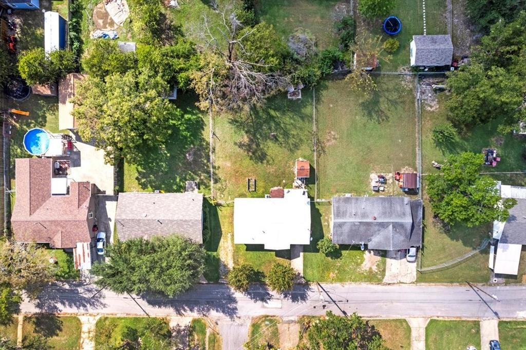 1309 Pine Street Bonham, TX 75418 - Photo 33 of 33 an aerial view of a house with a yard