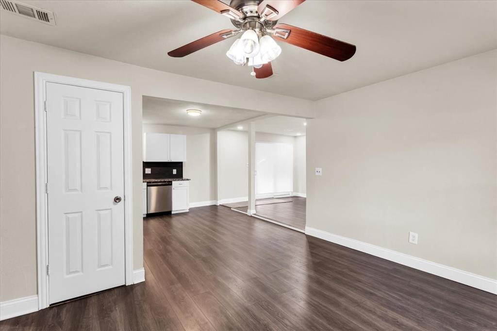 1309 Pine Street Bonham, TX 75418 - Photo 8 of 33 a view of an empty room with wooden floor