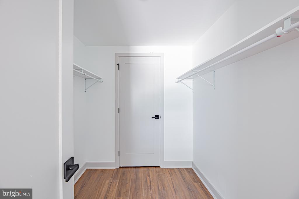 5001 Umbria Street, Unit U400 Philadelphia, PA 19128 - Photo 10 of 11 a view of room with hardwood floor