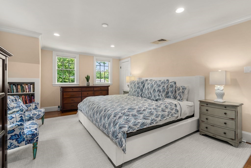 176 Dorset Road Newton, MA 02468 - Photo 15 of 27 a bedroom with a large bed and a dresser