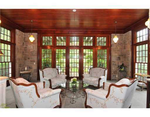 Undisclosed Address Greenwich, CT 06831 - Photo 13 of 20 a living room with furniture and a floor to ceiling window