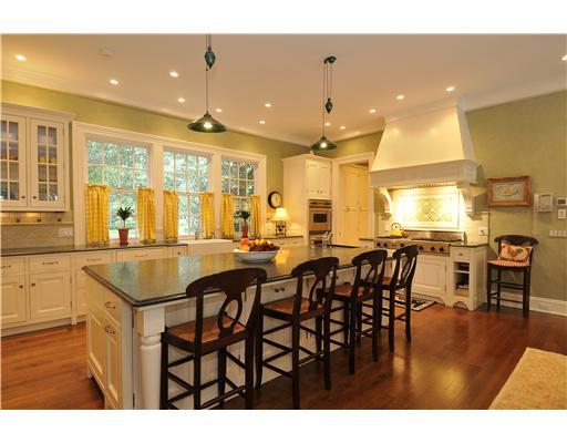 Undisclosed Address Greenwich, CT 06831 - Photo 8 of 20 a dining hall with stainless steel appliances granite countertop a dining table chairs and granite counter tops