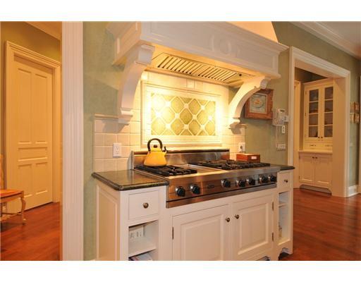 Undisclosed Address Greenwich, CT 06831 - Photo 9 of 20 a kitchen with stainless steel appliances a sink and cabinets