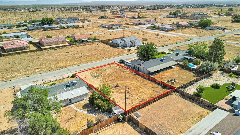9424 Walpole Edwards, CA 93523 - Photo 2 of 10 an aerial view of residential houses with outdoor space