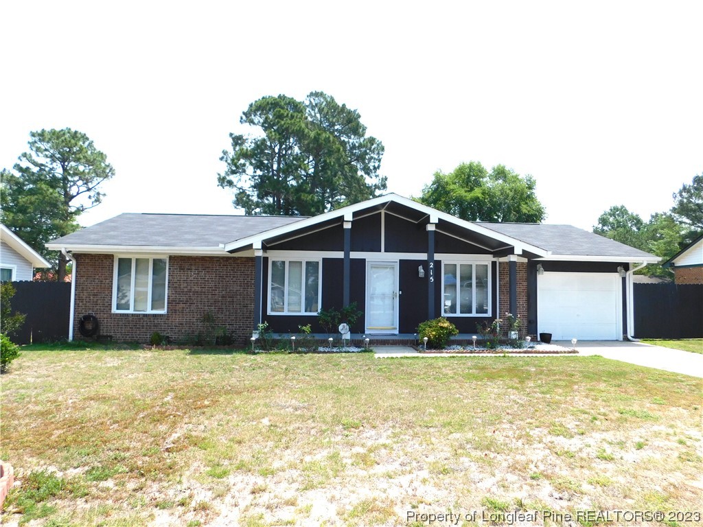 215 Duncan Road Spring Lake, NC 28390 - Photo 1 of 19 a view of a house with a yard