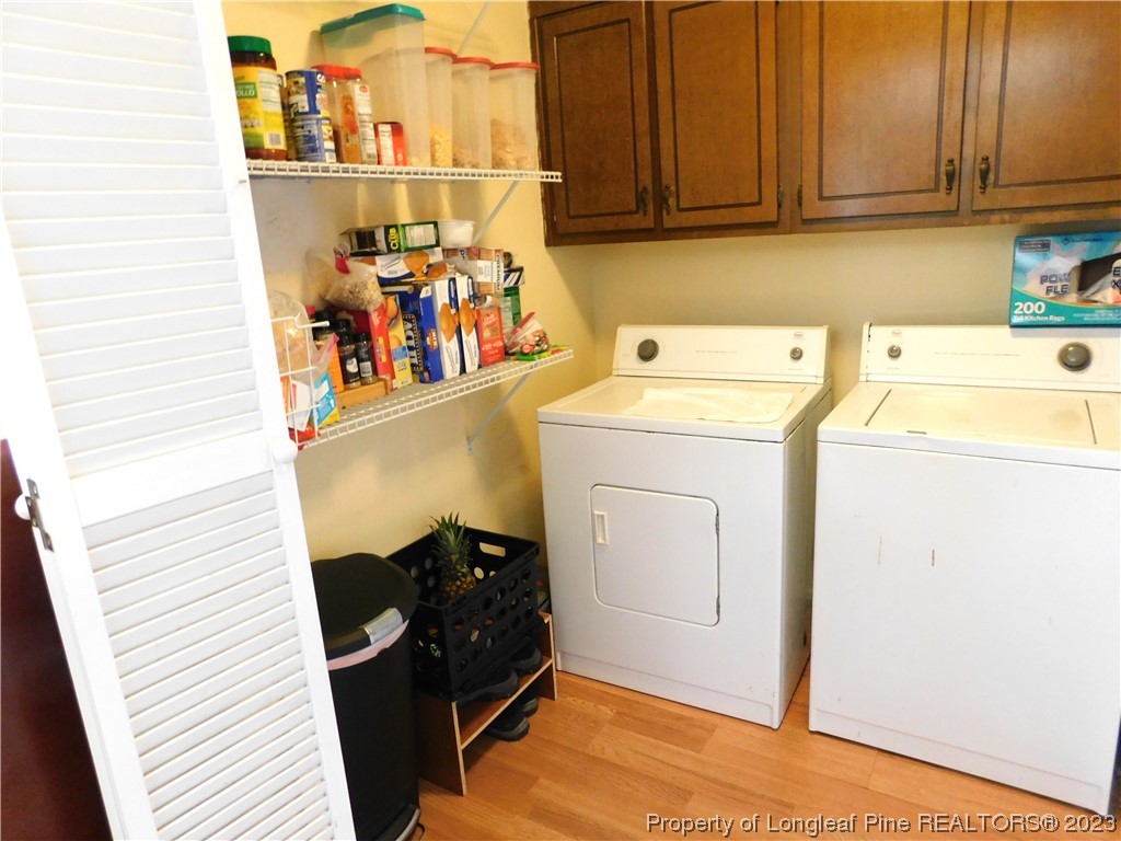 215 Duncan Road Spring Lake, NC 28390 - Photo 9 of 19 a utility room with dryer and washer