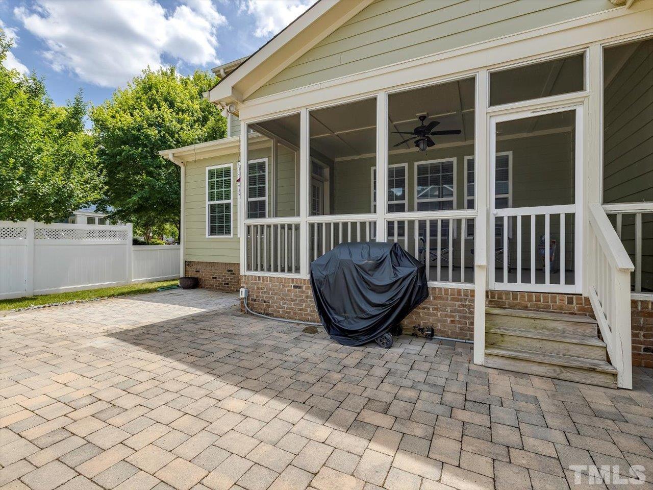 604 Chapanoke Road Raleigh, NC 27603 - Photo 11 of 30 a view of back yard of the house with a large window