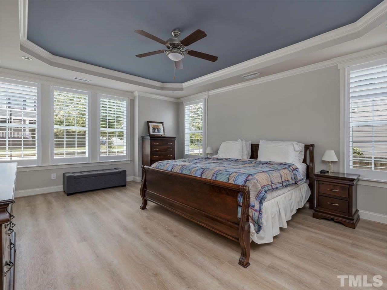 604 Chapanoke Road Raleigh, NC 27603 - Photo 13 of 30 a bedroom with a bed and a large window