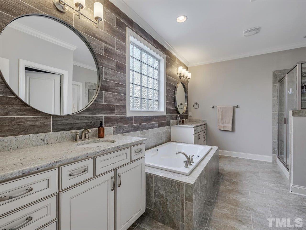 604 Chapanoke Road Raleigh, NC 27603 - Photo 14 of 30 a utility room with a sink a washer and dryer