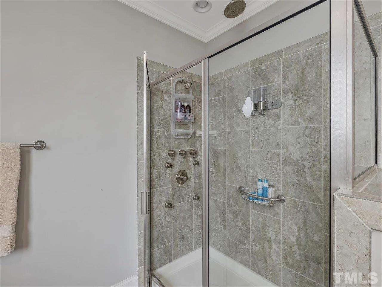 604 Chapanoke Road Raleigh, NC 27603 - Photo 16 of 30 a bathroom with a shower and a sink