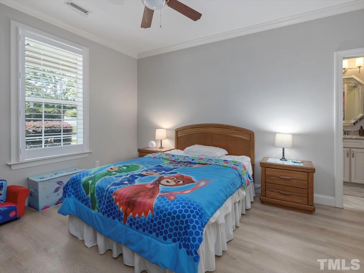 604 Chapanoke Road Raleigh, NC 27603 - Photo 17 of 30 a bedroom with bed and window