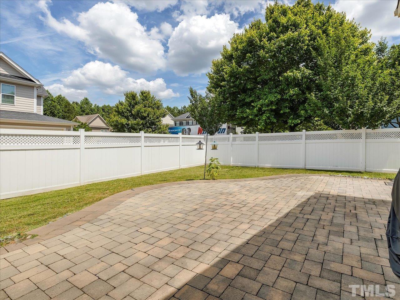 604 Chapanoke Road Raleigh, NC 27603 - Photo 10 of 30 a view of a swimming pool and a yard