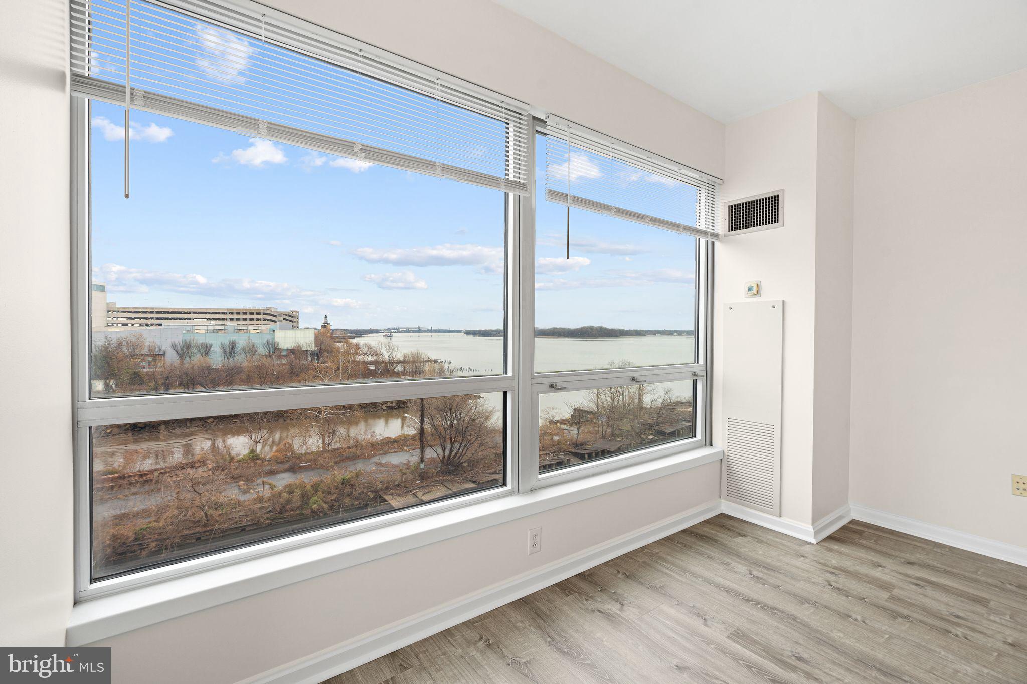 901 North Penn Street, Unit R506 Philadelphia, PA 19123 - Photo 4 of 10 a view of a glass door with a glass windows