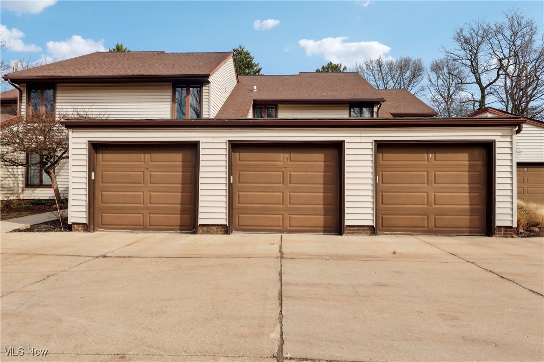 3484 Mayfield Road, Unit 3426 Cleveland Heights, OH 44118 - Photo 33 of 33 Garage featuring driveway