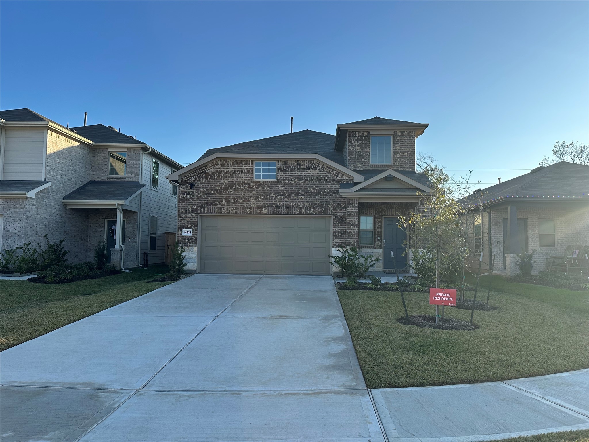 16936 Juniper Blossom Bend Conroe, TX 77302 - Photo 1 of 28 a front view of house with yard