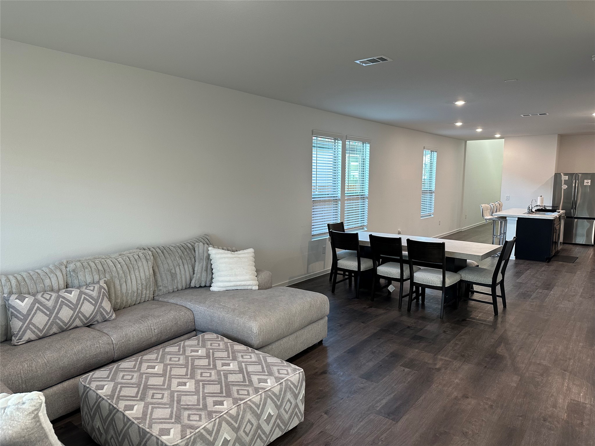 16936 Juniper Blossom Bend Conroe, TX 77302 - Photo 11 of 28 a living room with furniture and wooden floor