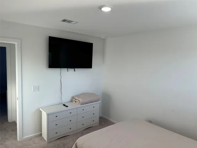 a view of a house with a swimming pool