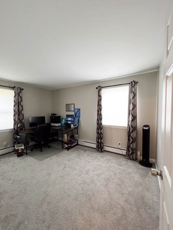 198 Senator Street Springfield, MA 01129 - Photo 22 of 27 an empty room with furniture and a ceiling fan