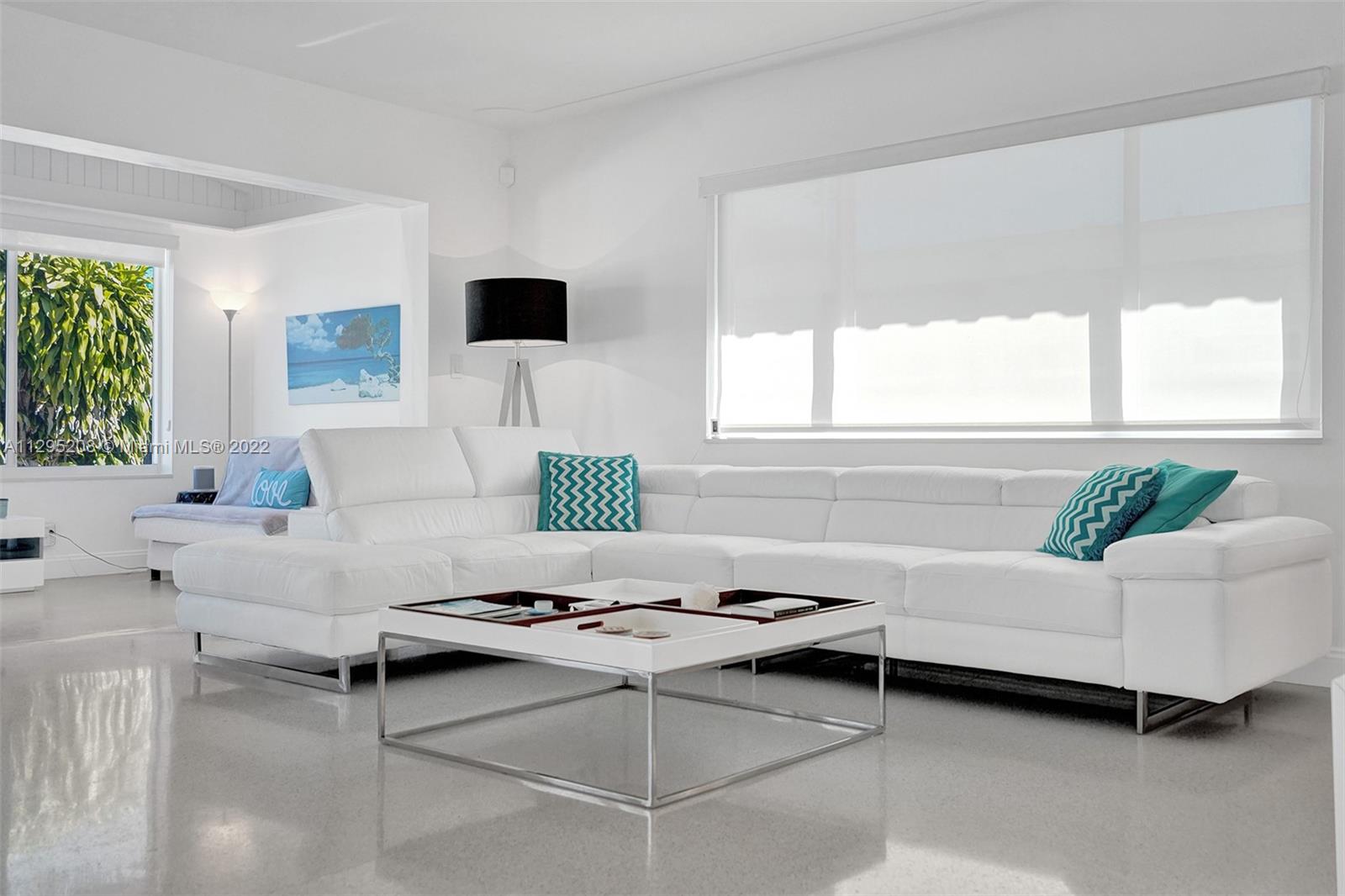 3411 Dover Road Pompano Beach, FL 33062 - Photo 17 of 64 a living room with furniture and a window