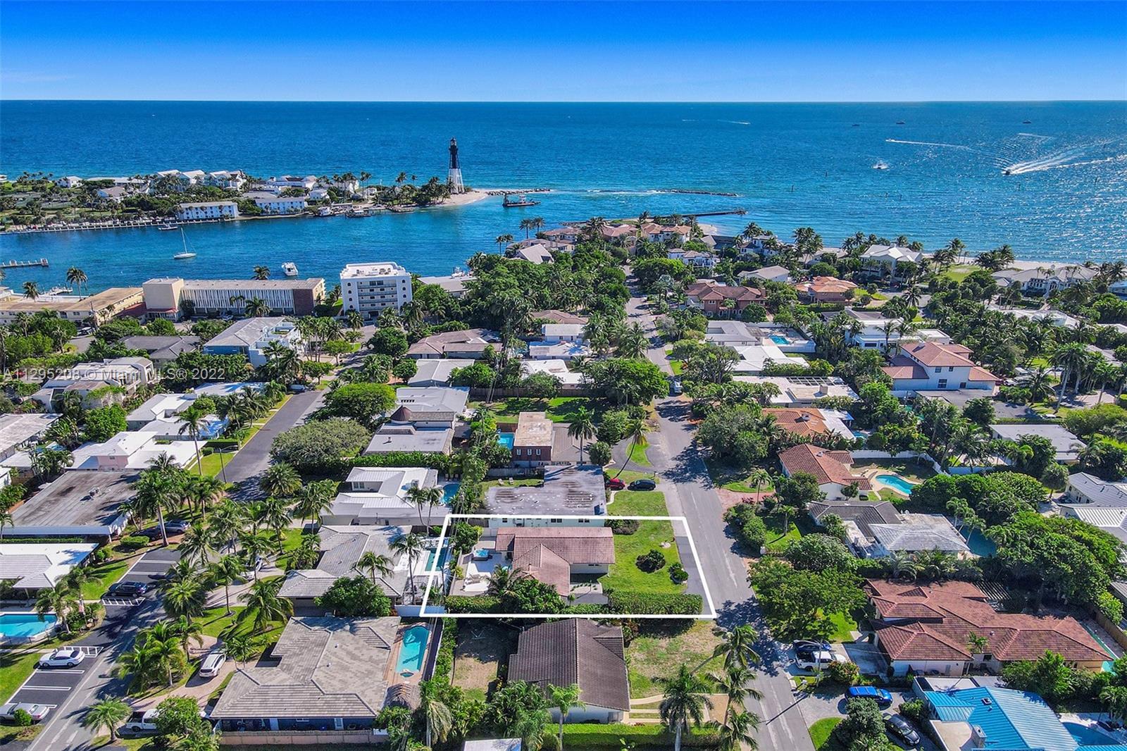3411 Dover Road Pompano Beach, FL 33062 - Photo 3 of 64 an aerial view of ocean and residential houses with outdoor space