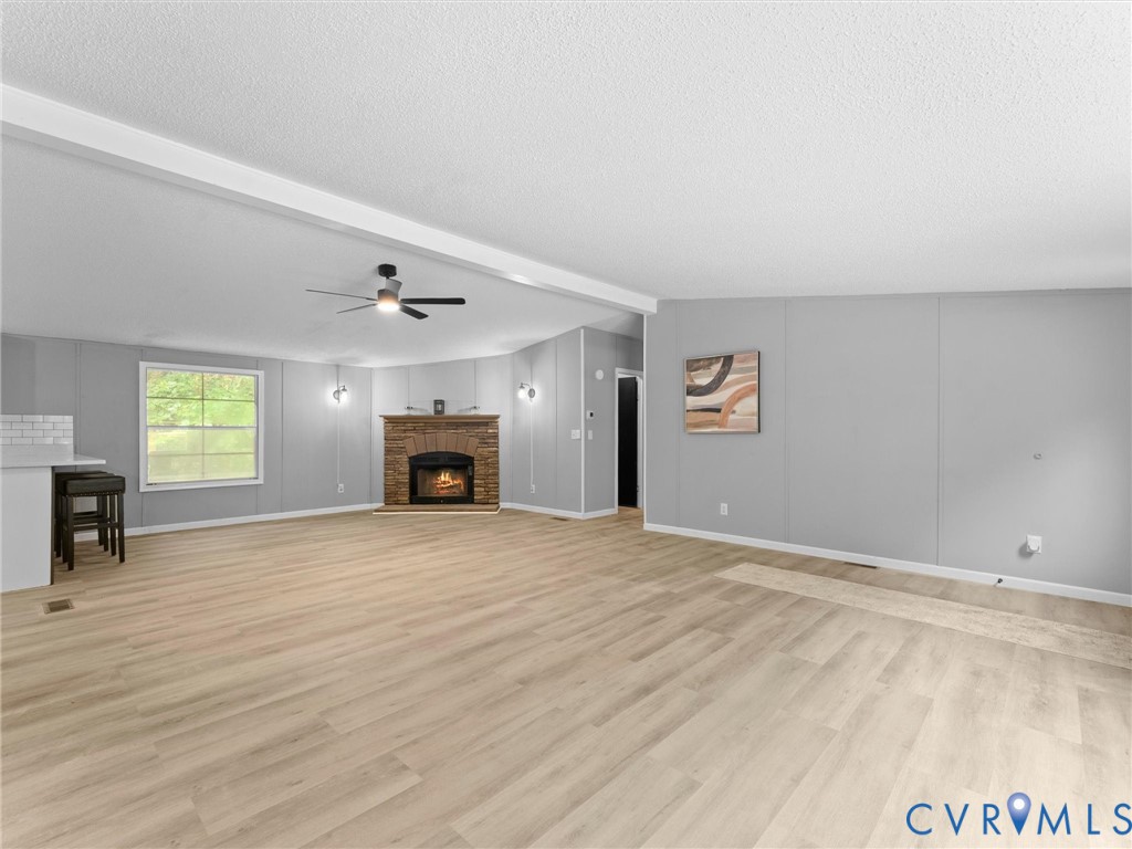 1909 Neves Road Beaverdam, VA 23015 - Photo 9 of 48 Spacious interior with light wood-finish flooring,