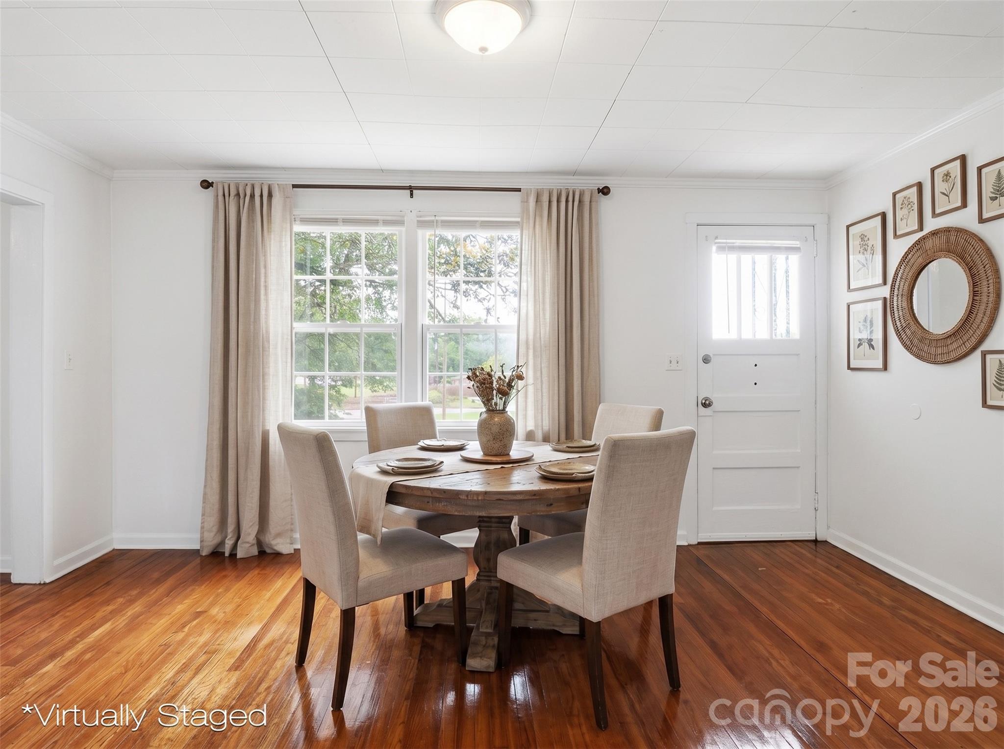 128 Ella Street Chester, SC 29706 - Photo 3 of 18 a view of a dining room with furniture window and wooden floor