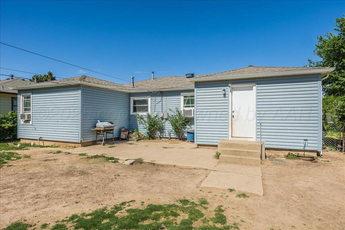 4317 Cline Road Amarillo, TX 79110 - Photo 16 of 18 a view of a house with a patio