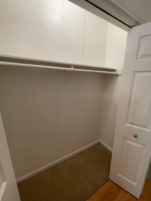 2529 Rio Grande Street, Unit 64 Austin, TX 78705 - Photo 7 of 9 Spacious closet featuring light wood finished floors