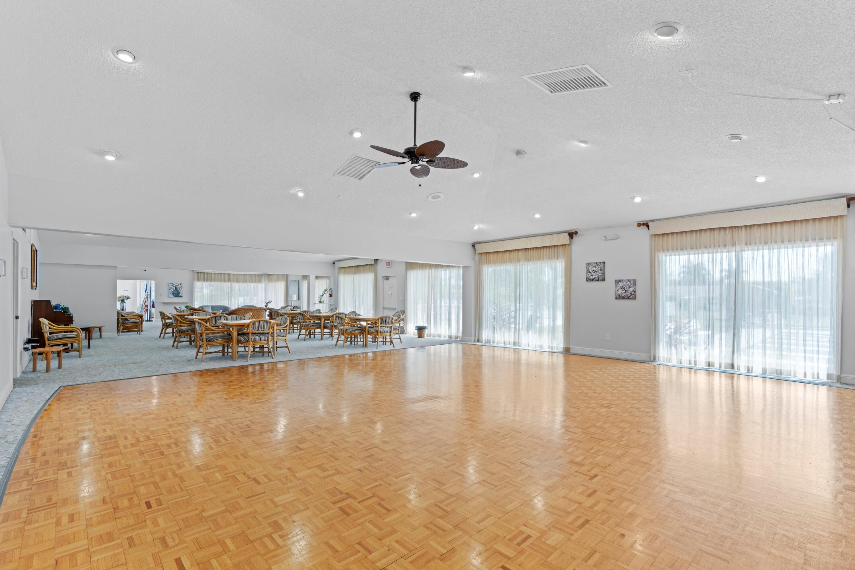 8555 Bella Vista Drive, Unit 86 Boca Raton, FL 33433 - Photo 27 of 48 a view of a living room and kitchen