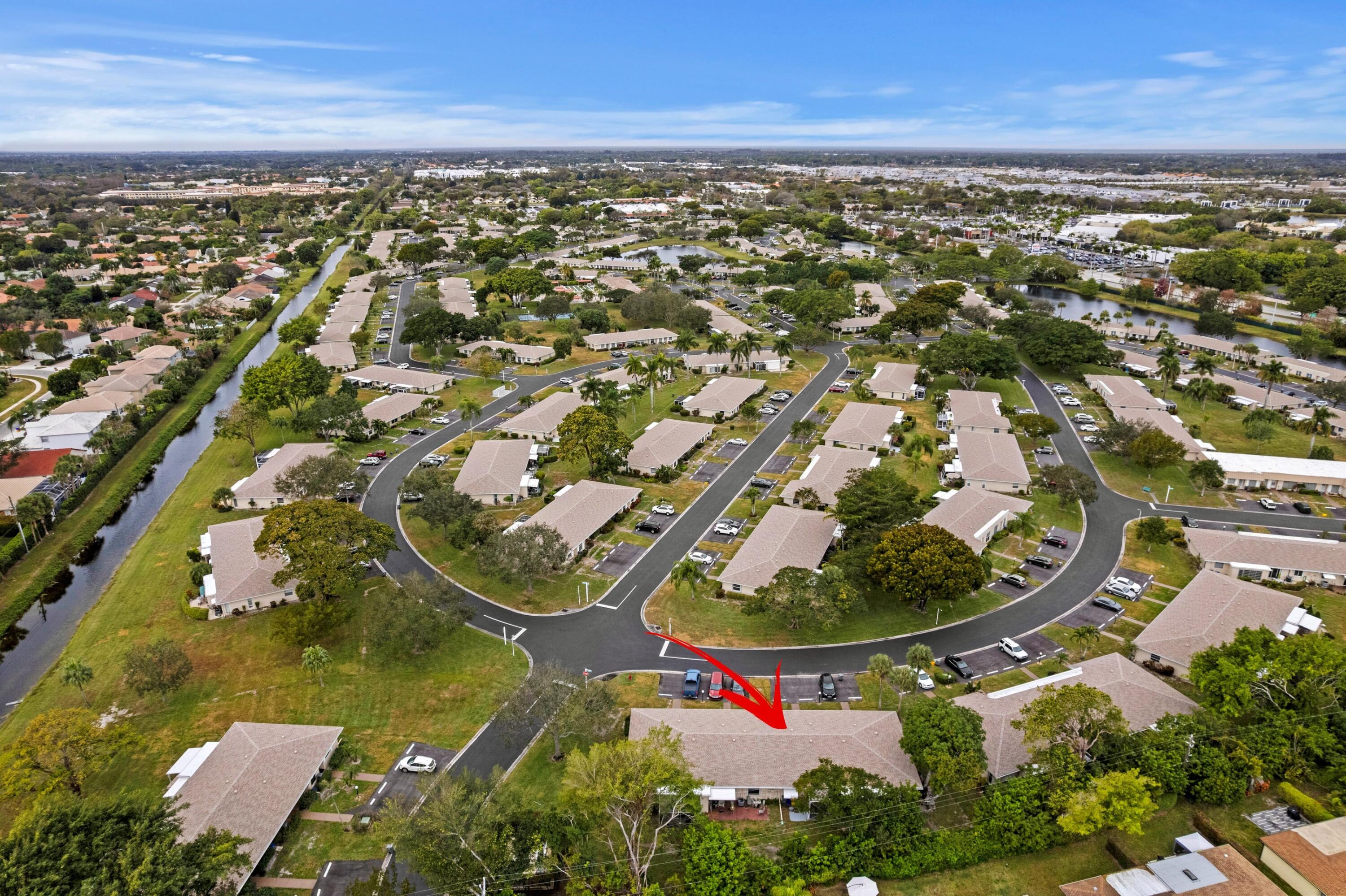 8555 Bella Vista Drive, Unit 86 Boca Raton, FL 33433 - Photo 28 of 48 an aerial view of a house with a outdoor space