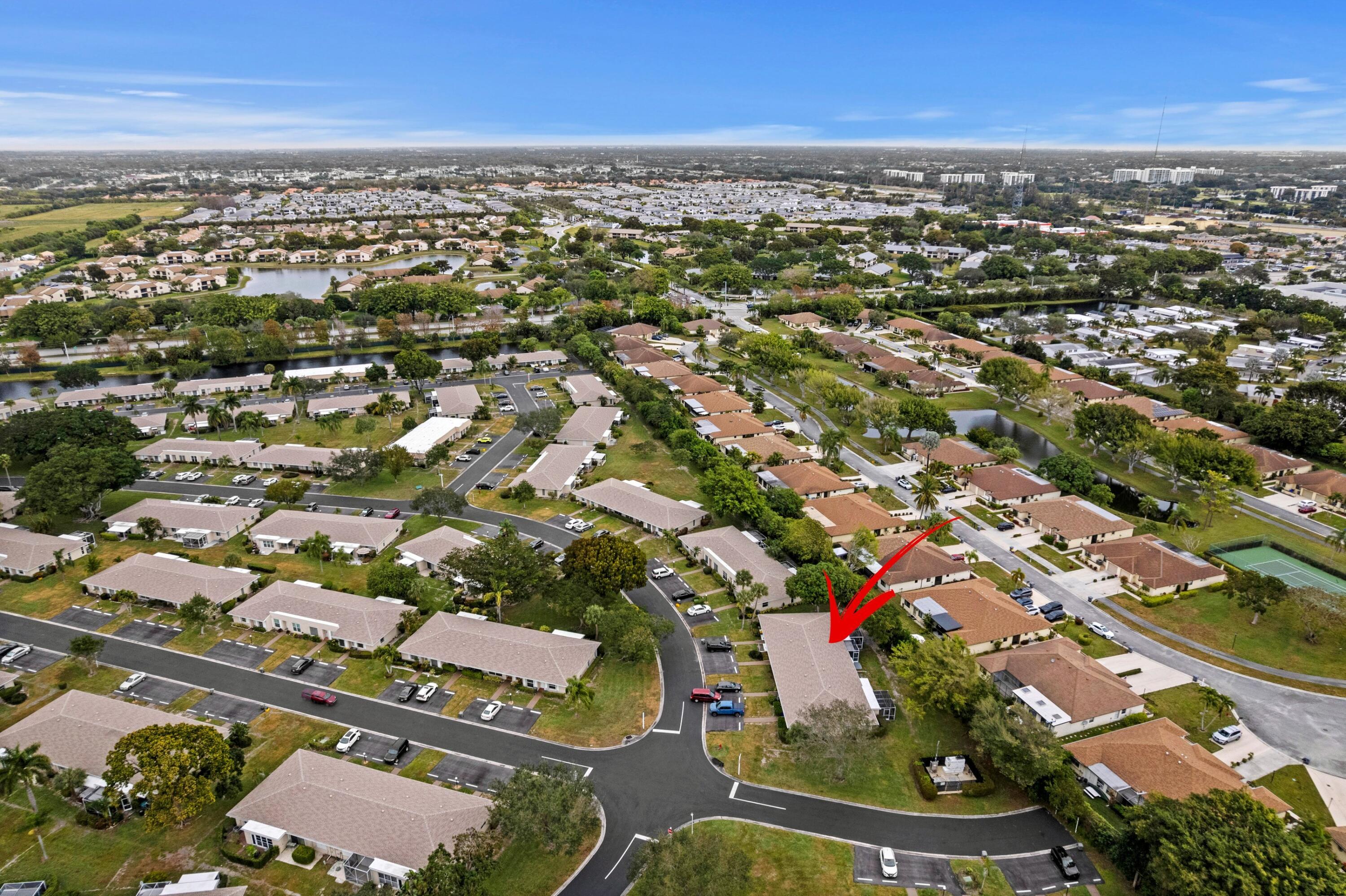 8555 Bella Vista Drive, Unit 86 Boca Raton, FL 33433 - Photo 30 of 48 an aerial view of multiple house