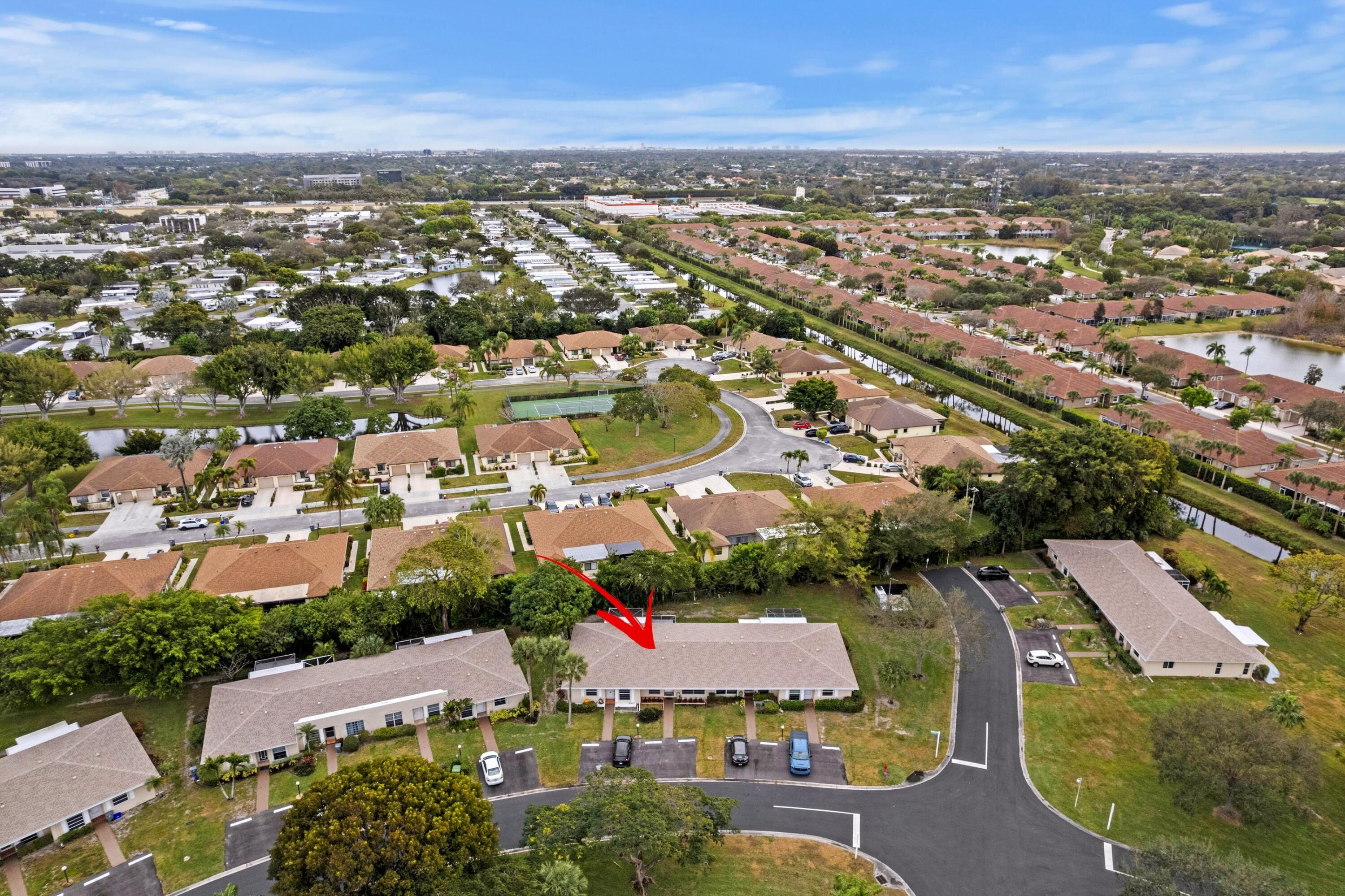 8555 Bella Vista Drive, Unit 86 Boca Raton, FL 33433 - Photo 32 of 48 an aerial view of residential houses with outdoor space