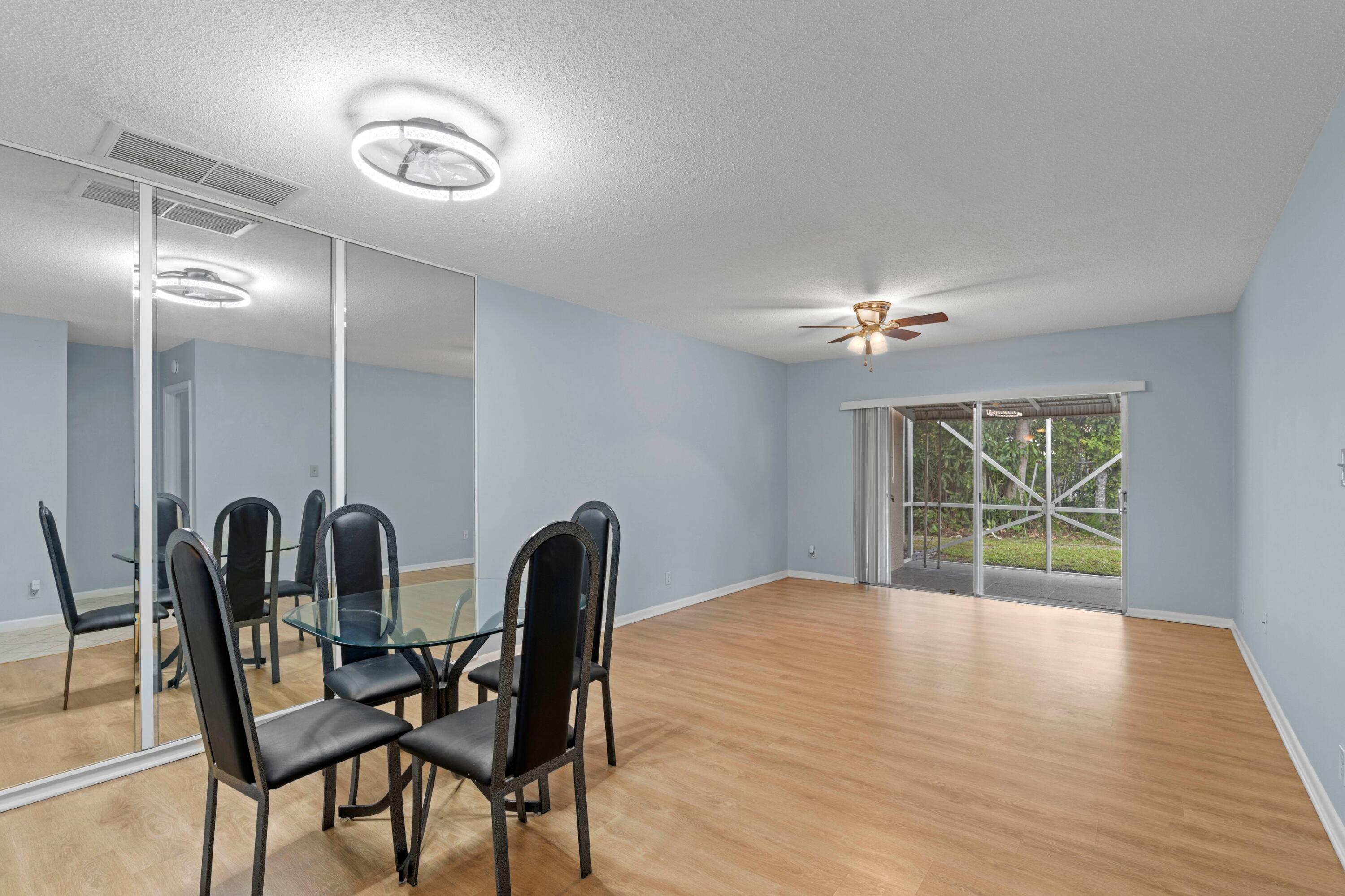 8555 Bella Vista Drive, Unit 86 Boca Raton, FL 33433 - Photo 4 of 48 a view of a livingroom with furniture and window