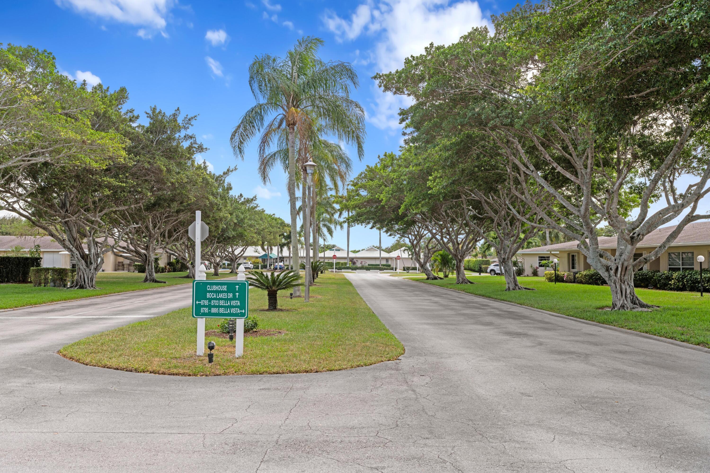 8555 Bella Vista Drive, Unit 86 Boca Raton, FL 33433 - Photo 46 of 48 a view of a fountain in front of a house