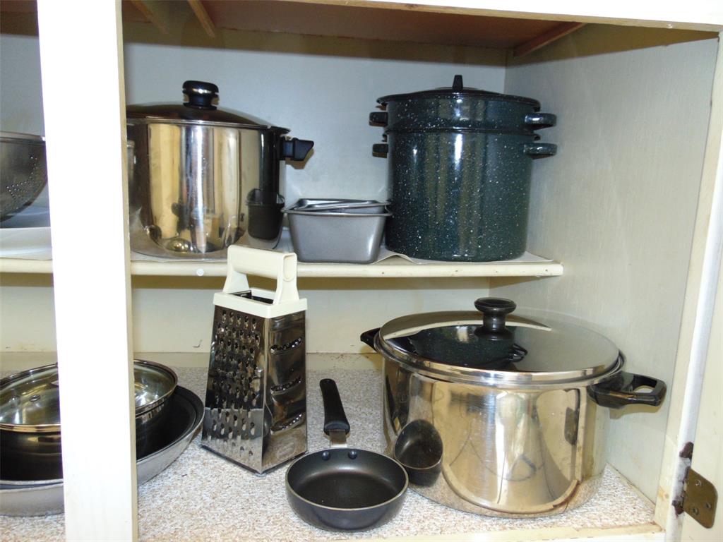 9788 Marina Boulevard, Unit 313 Boca Raton, FL 33428 - Photo 16 of 70 a kitchen with a sink and a stove