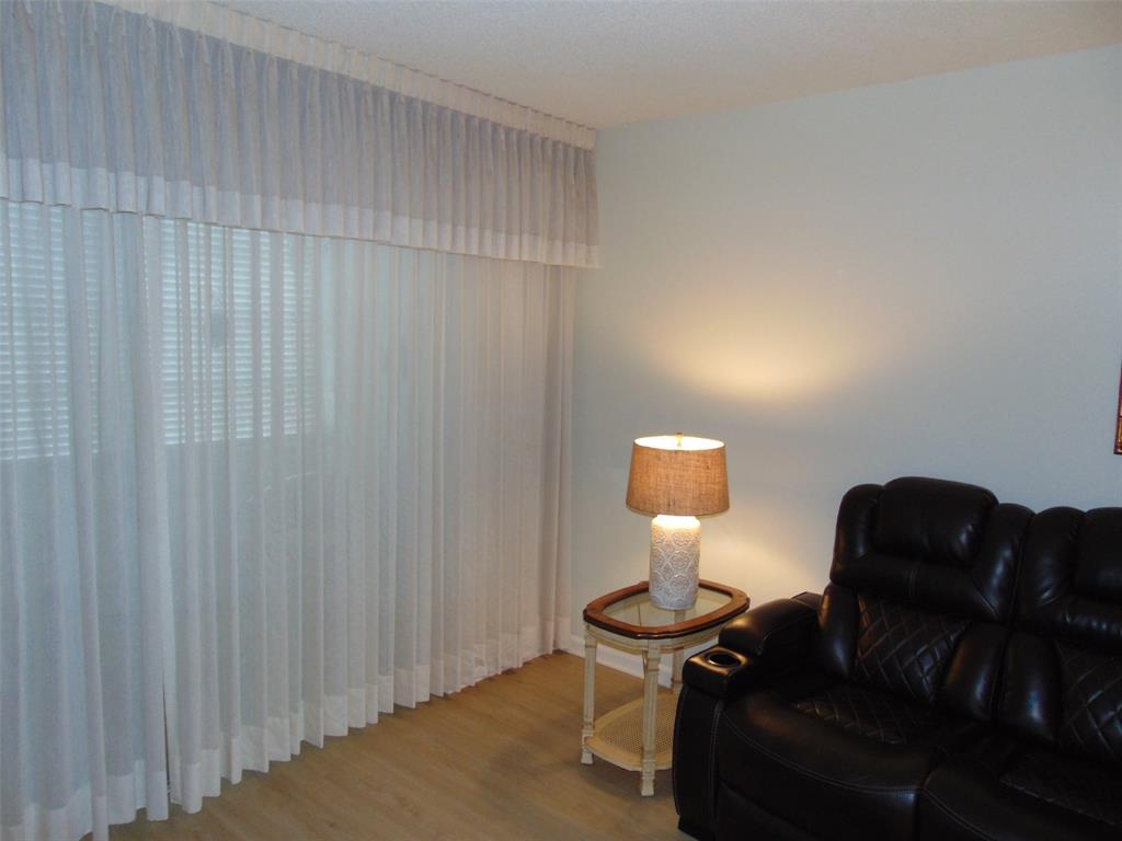 9788 Marina Boulevard, Unit 313 Boca Raton, FL 33428 - Photo 26 of 70 FULL DRAPES AT LIVING ROOM TO FLOIRIDA ROOM SLIDING GLASS DOOR