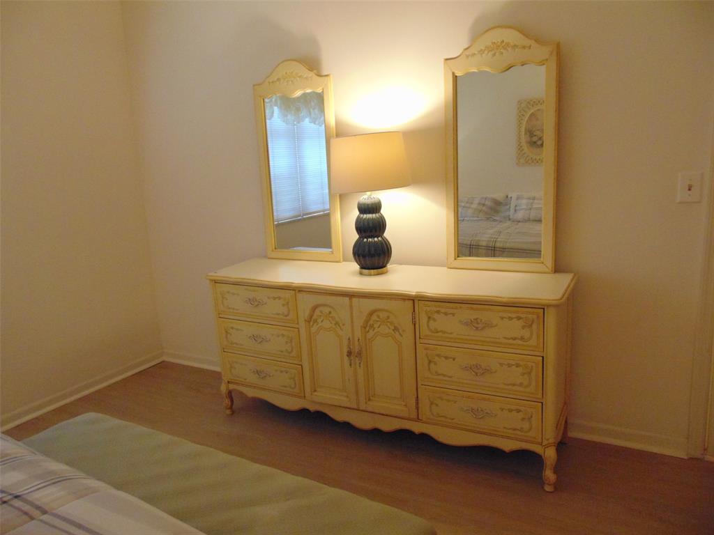 9788 Marina Boulevard, Unit 313 Boca Raton, FL 33428 - Photo 31 of 70 a bathroom with a sink and a mirror