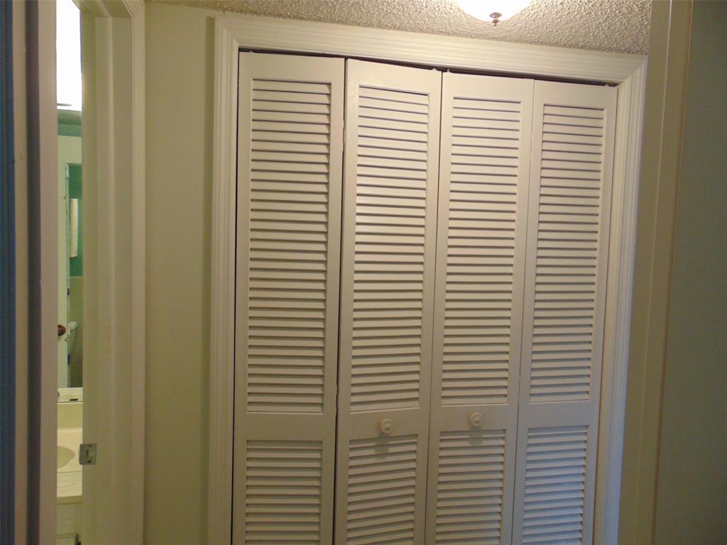 9788 Marina Boulevard, Unit 313 Boca Raton, FL 33428 - Photo 9 of 70 HALLWAY CLOSET AT GUEST BATH