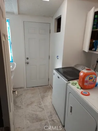 a bathroom with a toilet and a sink