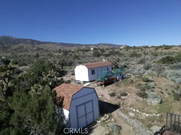 a view of a outdoor space with mountain view