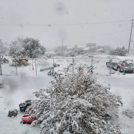 a room with furniture and a book shelf