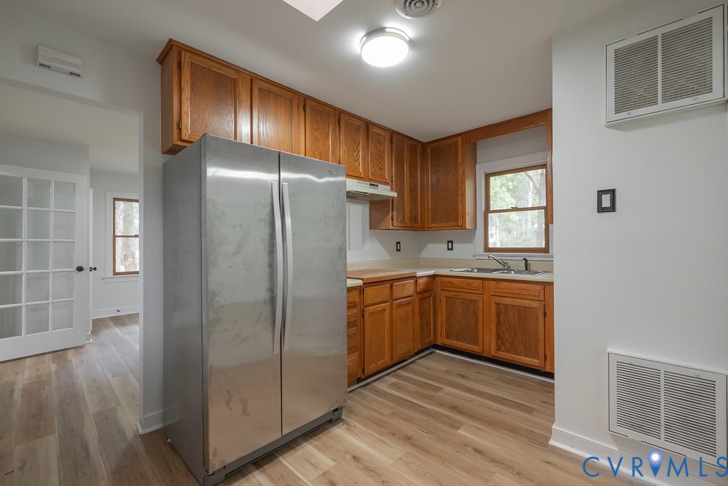 11840 Winfore Drive Midlothian, VA 23113 - Photo 24 of 40 Kitchen with wood cabinetry, light-tone countertop
