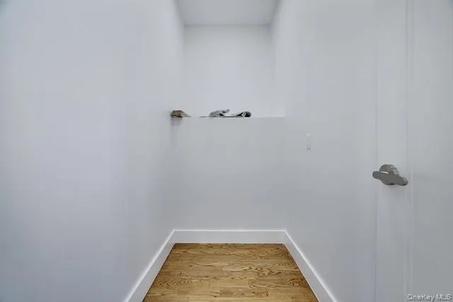 a view of a room with rack on the wall